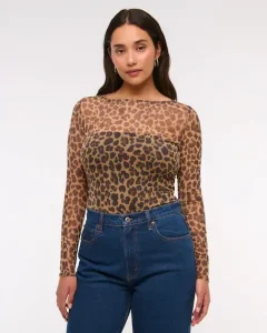 Mitos de la moda: 7 claves para vestir mejor 5 Body de malla y escote barco con manga larga
