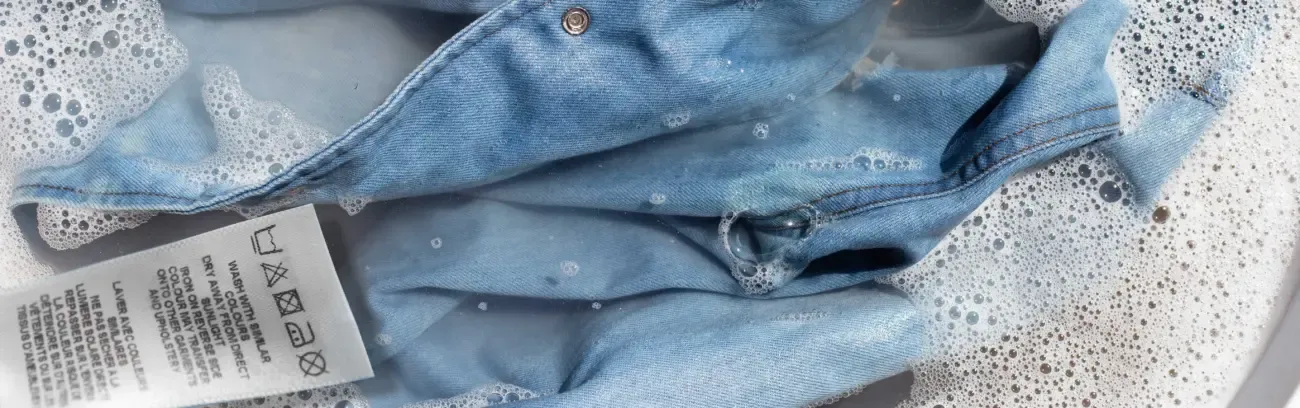 jean shirt soak powder detergent water dissolution washing cloth laundry concept