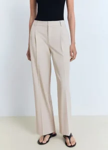 Largo del pantalón de mujer según tu calzado favorito 13 Pantalones de diseno recto con tiro alto pinzas y largo del pantalon completo. Cuentan con un cierre oculto forro interior y estan disponibles en tallas grandes